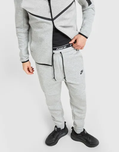 Nike  Donji dio trenirke M NK TCH FLC JGGR 