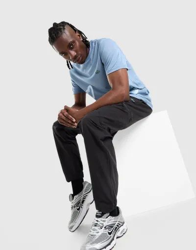 Lacoste  Donji dio trenirke LACOSTE-SPODNIE WOVEN 